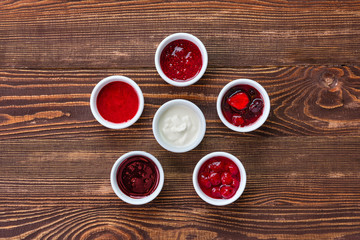 Overhead view of assortment of fruit puree. Jam, confiture, chutney or sauce from berries.