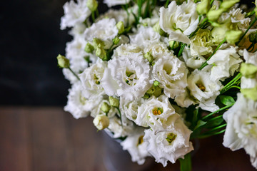 Rose cappuccino, brunia, daffodil, Eustoma, lisianthus, ranunculus, Skimia the most beautiful bouquet of flowers this year