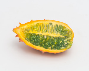 The cut fire ginseng fruit is isolated on a white background.