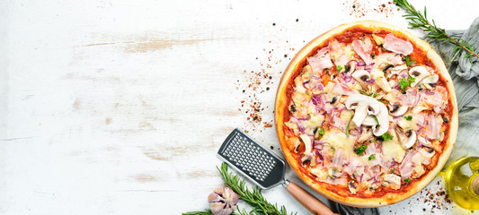 Traditional Italian pizza with mushrooms and bacon. Top view. free space for your text. Rustic...