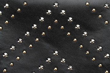 leather background with metal rivets