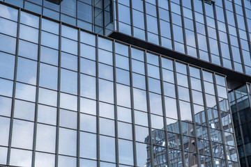 Obraz premium City cbd office building dense window glass curtain wall