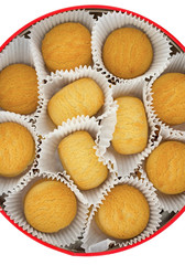 cookies in a round metal box