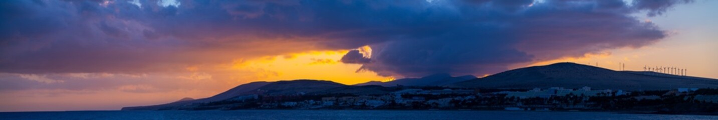  Panorama of Golden Sunset Over The Mountains Silhouette Of A Mountain Range Against The Sky At Sunset