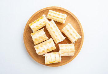 Shark bones dried on a saucer on white background