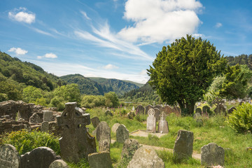 Fototapeta na wymiar View of the ancient cemetery at Glendalough, an early Christian monastic settlement in Co. Wicklow, Ireland.