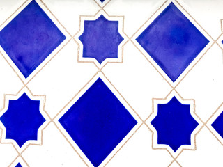 White-blue tile background, typical emblem of southern Spanish Andalusia, decoration of houses and buildings of various kinds on Cosa del Sol