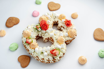 number eight cake decorated with flowers, cream of cheese, marshmallow, Bizet on a white background. International Women's Day postcard March 8