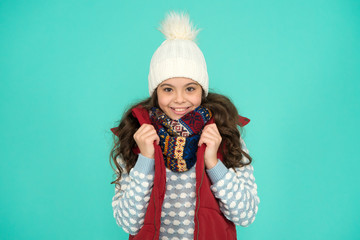 Portrait of smiling girl hipster. Youth street fashion. Winter fun. feeling cold this season. Dress in layers and wear hat. Stay active. it is cold outside. kid warm knitwear. winter vibes