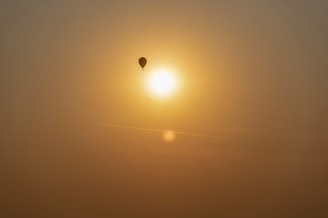 Hot Air Balloon Silhouettes At Sunrise in slovenia