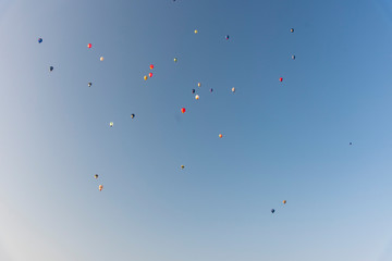 Fototapeta na wymiar Colored Baloons Fly Away