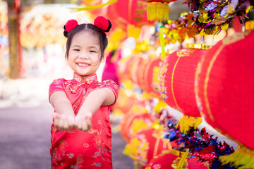 cute little asian girl in chinese traditional dress.Happy chinese new year concept.