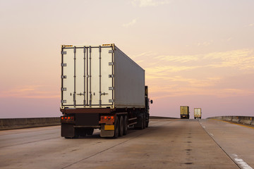 White Truck on highway road with  container, transportation concept.,import,export logistic industrial Transporting Land transport on the asphalt expressway