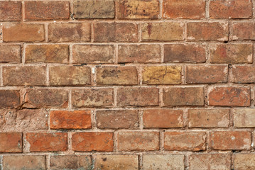 Old brick wall. Masonry of red brick closeup.