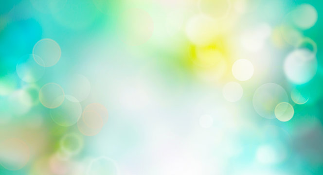 Spring or summer background blur -  abstract banner - green blurred bokeh lights