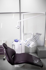 Workplace of dentist with dental unit and chair