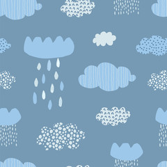 Cute seamless pattern with blue clouds, raindrops and hand drawn textures on a white background. Illustration in Scandinavian style for Wallpaper, fabric, textile, packaging paper design. Vector