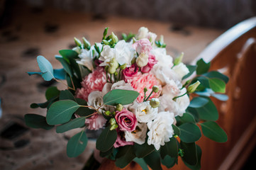 Colorful bouquet of flowers on the sofa