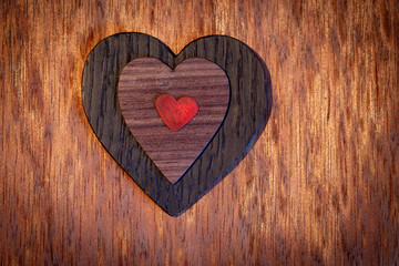 Wooden heart on old wooden background