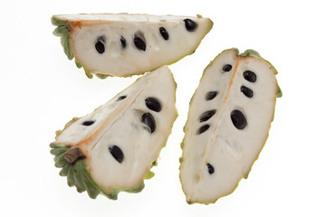 tropical fruits in a cut on a white background
