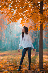  Woman in white jumper, black hat, autumn nature, happy