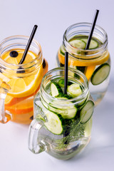 Glass Jars with Fresh Infused Water Made With Organic Fruits and Vegetables Healthy Detox Drink Vertical