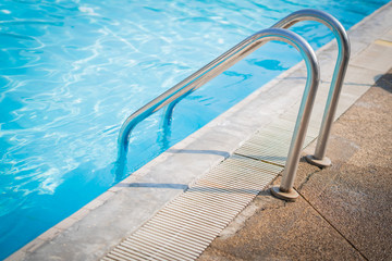 water sparkling and rippling in the sun at the swimming pool