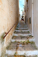 Side street of Ostuni town with staircase, Apulia region, Italy, Adriatic Sea