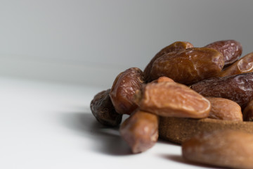 dried dates palm on white background