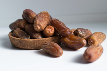 dried dates palm on white background