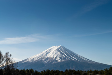 Plakat Fuji mountain with snow cover on the top with could, Japan
