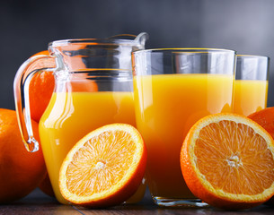 Naklejka na ściany i meble Glasses with freshly squeezed orange juice