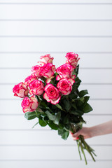 Beautiful bouquet of mixed flowers with roses. The work of the florist. Flower delivery
