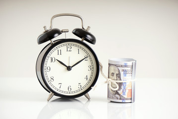 alarm clock and money