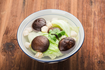 Mushroom and scallop soup with mustard