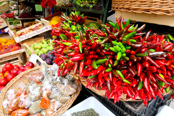 Chillies, red chilli pepper, on the traditional italian fruit, vegetable and spice market in...