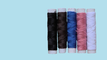Colored of yarn on sky background . Yarn for knitting.