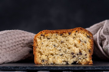 Fresh baked cupcake on dark background