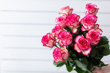 Beautiful bouquet of mixed flowers with roses. The work of the florist. Flower delivery