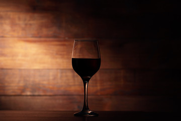 goblet with wine on the counter
