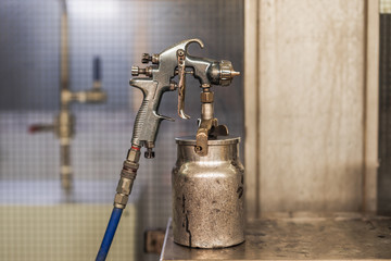 old spray gun with lower tank location