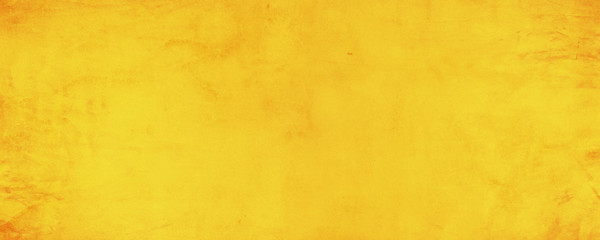 Horizontal yellow and orange texture cement wall background