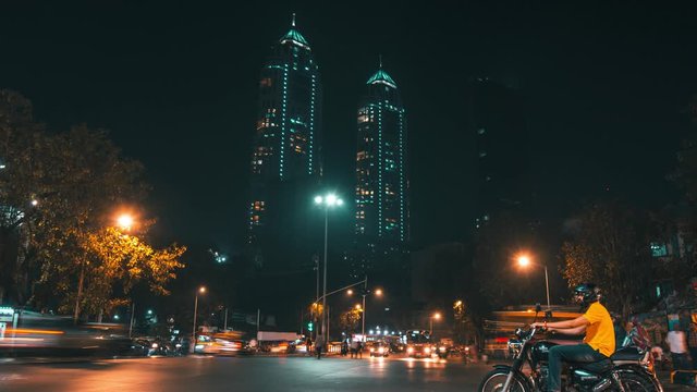 Night timelapse of Busy Mumbai Junction near the Imperial buildings Mumbai