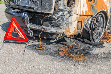 Burnt out car after a severe accident, Germany