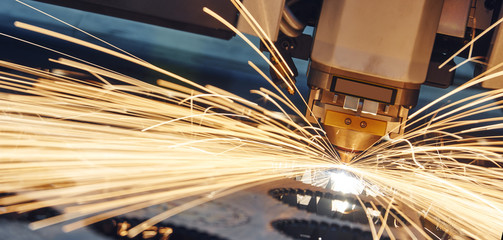 Laser cutting. Metal machining with sparks