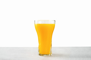 GLass of fresh orange juice isolated on white