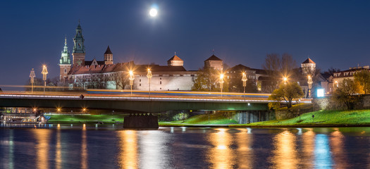 Fototapeta na wymiar Krakow, Poland, Night panorama of Wawel Castle over Vistula river