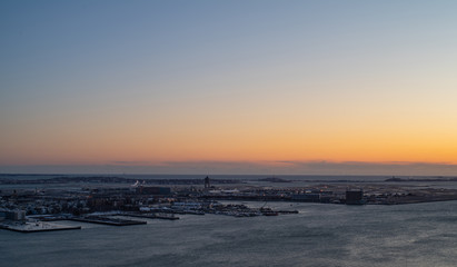 Boston Harbor And Horizon At Sunrise In Winter