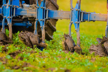 Fototapeta premium farmer plowing his fields in early spring