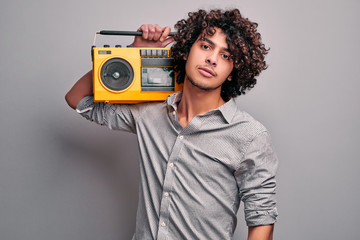 Student with music beat box on isolated gray background